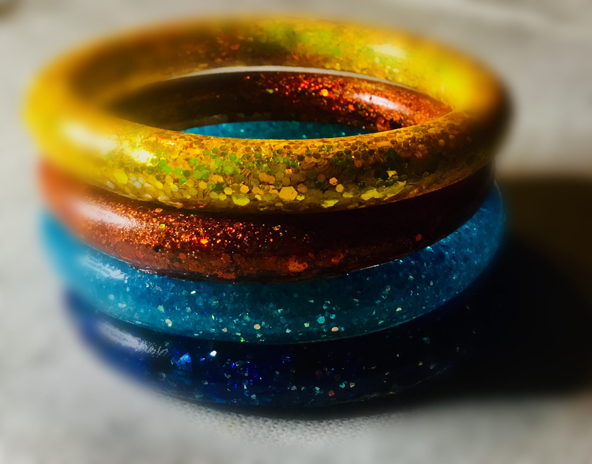 Set of 4 colourful glitter bangles