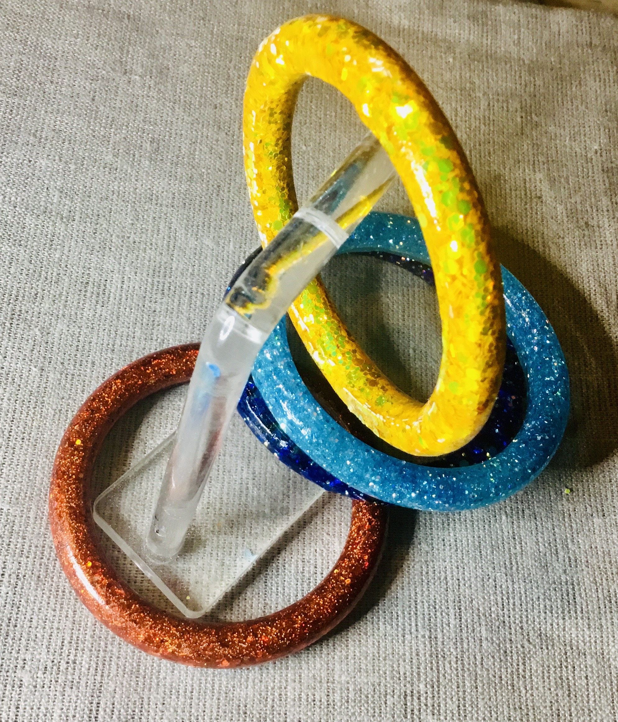 Set of 4 colourful glitter bangles