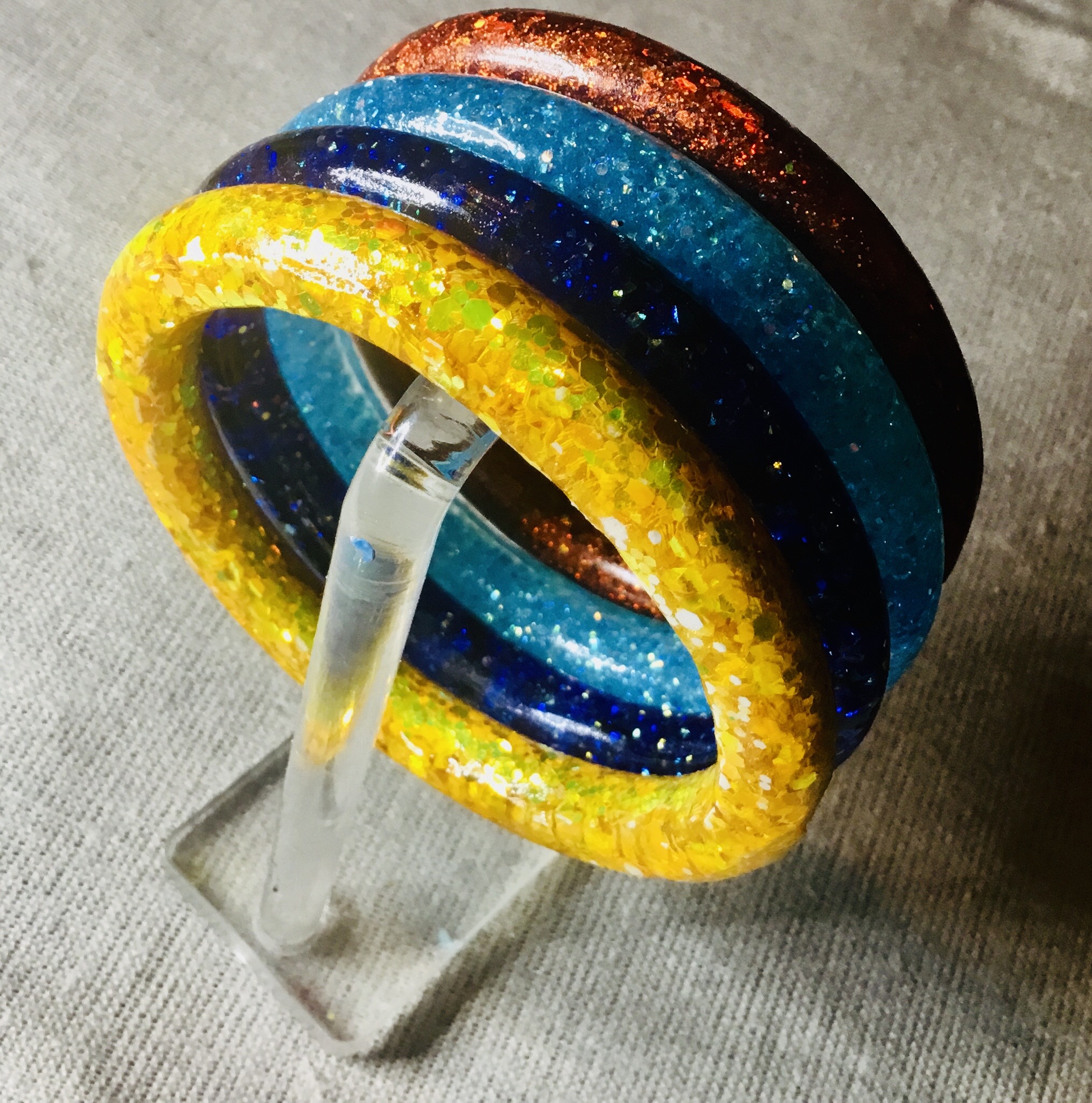 Set of 4 colourful glitter bangles