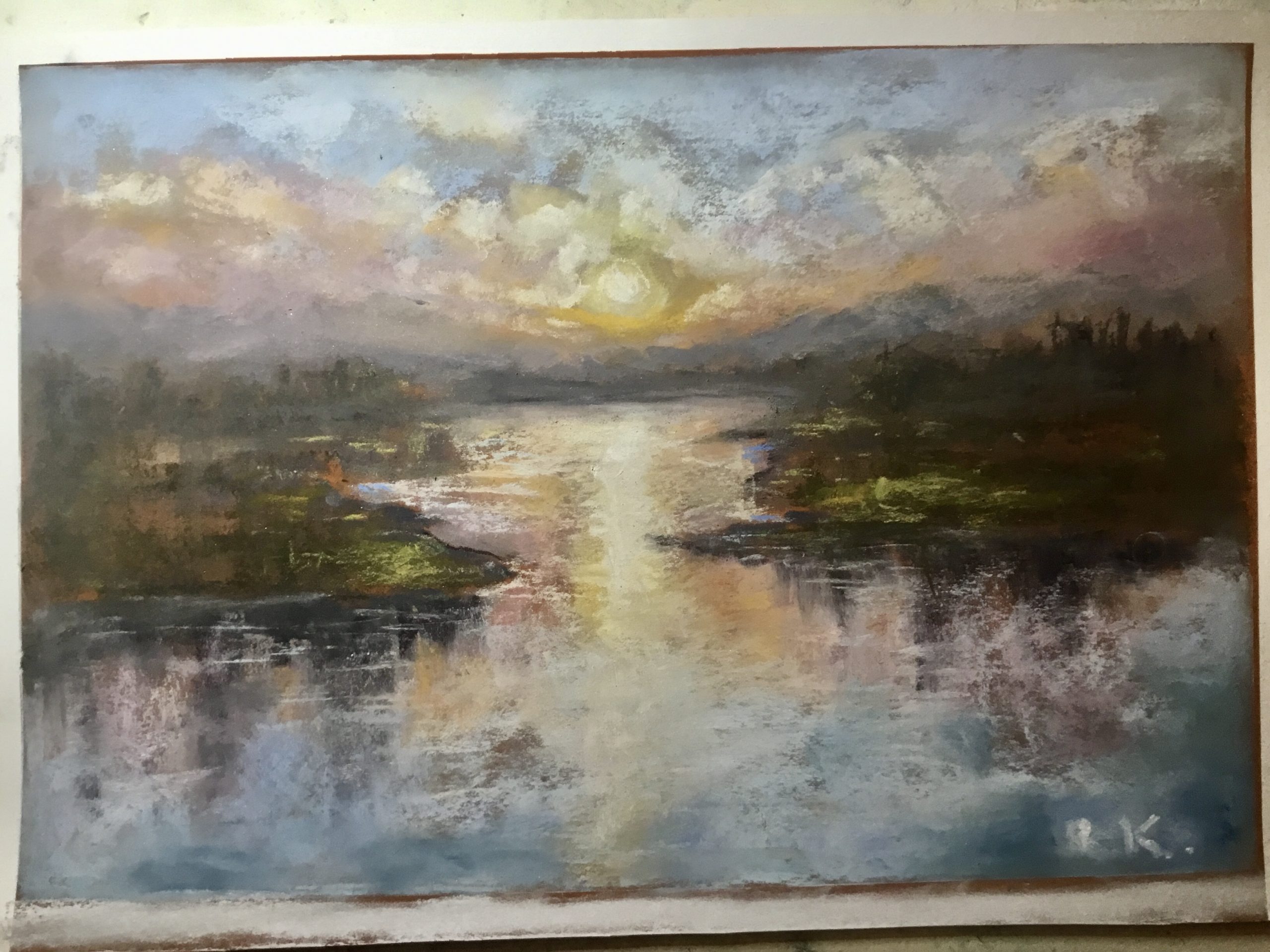 Soft Sunrise Over Calm Waters