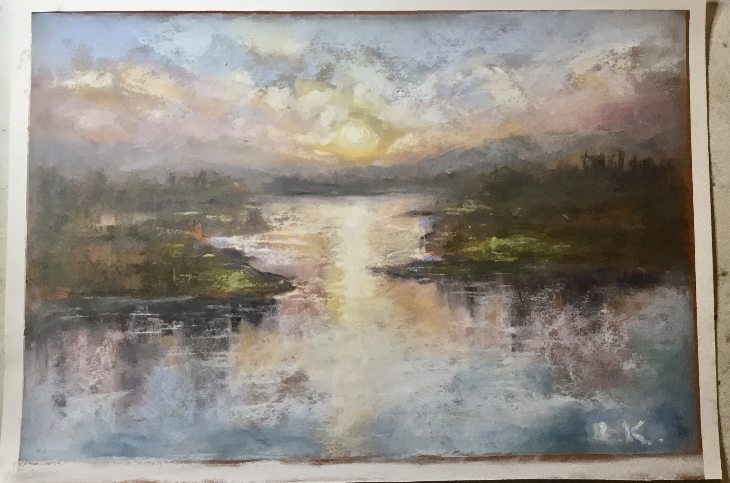 Soft Sunrise Over Calm Waters